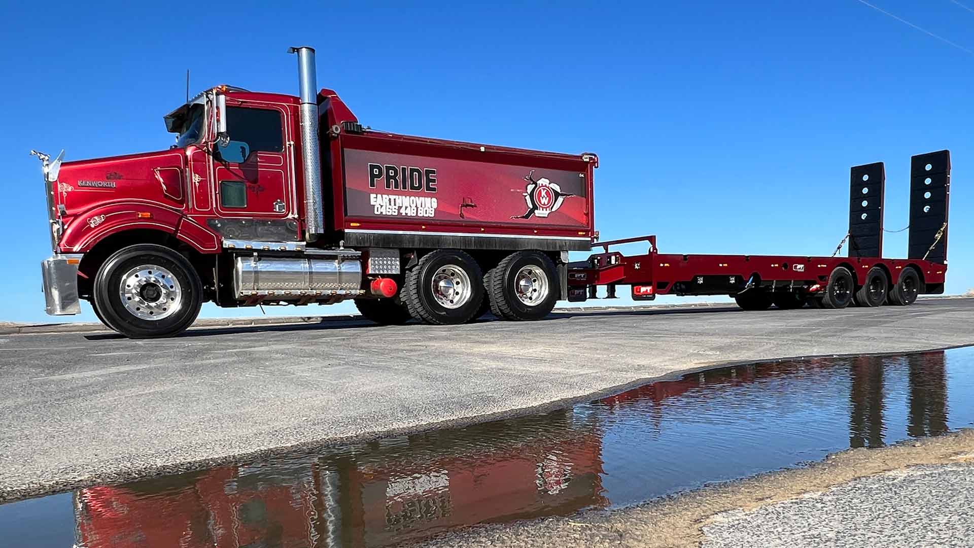 Red custom trailer for plant equipment in Geelong