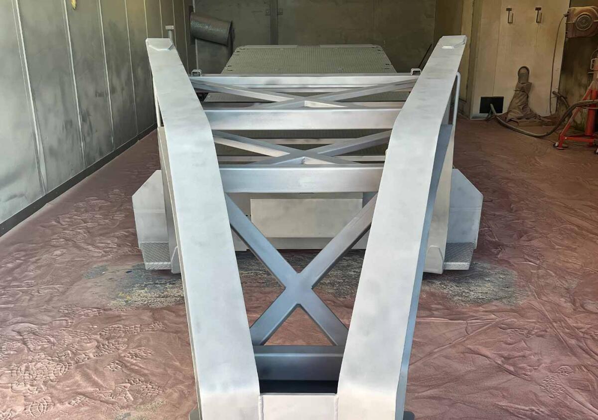Sandblasting and painting heavy duty trailer by Ultimate Plant Trailers in Geelong