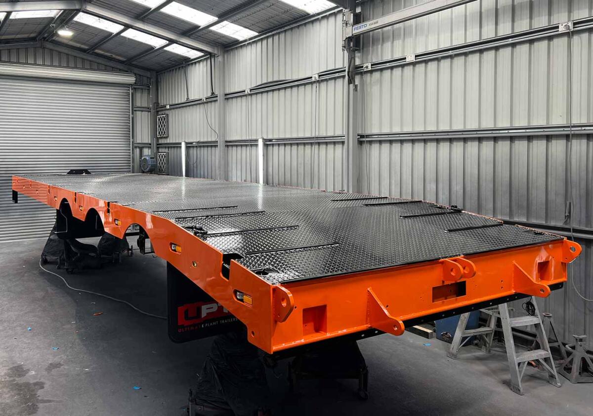 Sandblasting and painting heavy duty trailer by Ultimate Plant Trailers in Geelong